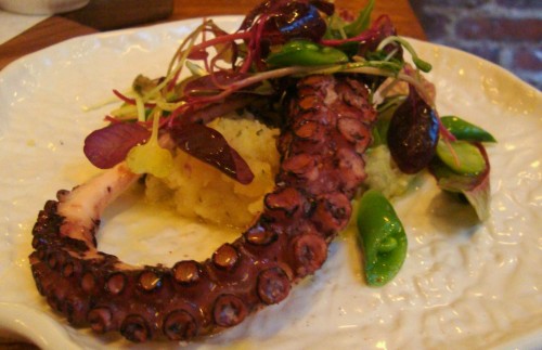 Pulpo A La Braza - Grilled octopus, fingerling potatoes, olive oil and greens.