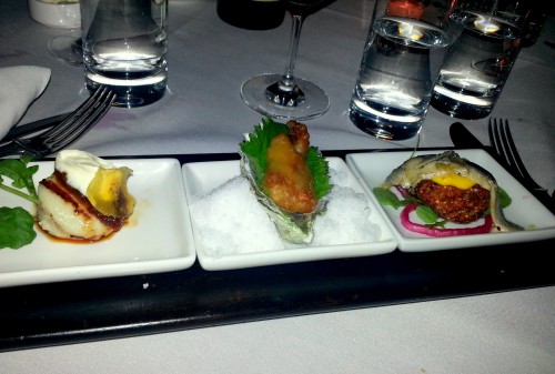 Seafood Trio (L-R): Grilled scallops with sweet chili sauce, crÃ¨me fraiche and green plantain crisps; Fried Hama Hama oysters with shiso, sansho pepper, and wasabi-yuzu dipping sauce; Marinated white anchovies on quinoa croquettes with spicy saffron aioli