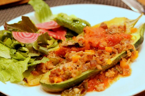 Dinner tonight: Stuffed pepper, stuffed zuchini, and a side of greens and beets.